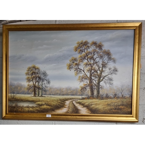 718 - P Varley. A 20th Century Oil on Canvas of a tranquil scene with path and trees and lake to the fore.... 