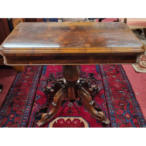 732 - A Fantastic 19th Century Rosewood Foldover Card Table on carved quatrefoil base with octagonal shaft... 