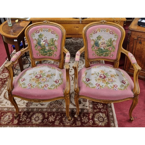 736 - A lovely pair of 20th Century Continental Walnut showframe Armchairs with tapestry upholstered seats... 