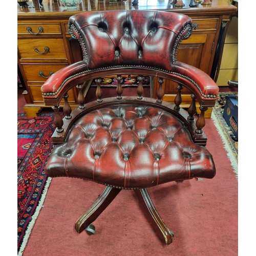 746 - A good burgundy ground swivel Office Chair. W 62  x SH 43 x BH 83 cm approx.