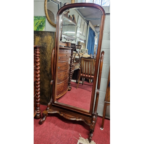 884 - A reproduction Mahogany Cheval Mirror with bevelled mirror glass. W 78 x H 170 cm approx.