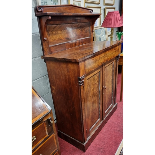 910 - Of Superb quality. An early 19th Century Mahogany two door Cabinet with gallery back. W 90 x 40 x H ... 