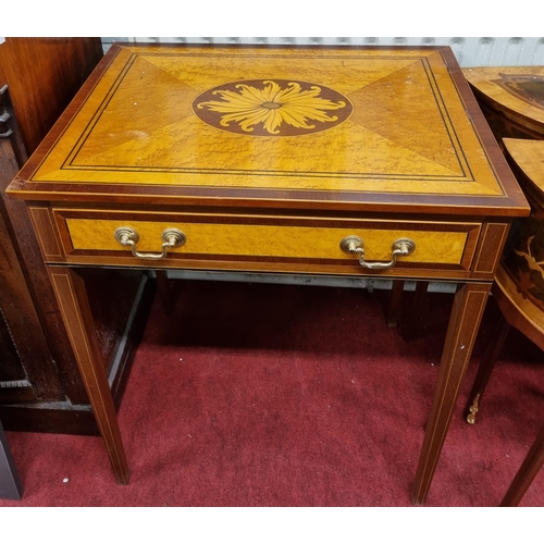 915 - A good pair of Mahogany and veneered side Tables with Satinwood veneered tops and shell inlay. 61 x ... 