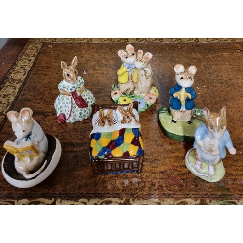 967 - A good quantity of Beswick Figures to include an early Johnny town mouse along with two Royal Copenh... 