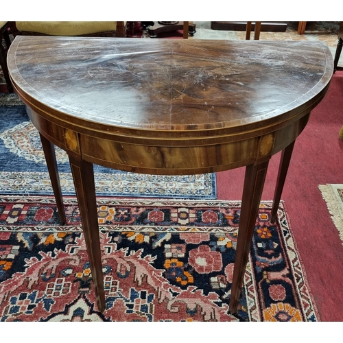 981 - A 19th Century Mahogany and Inlaid demi lune foldover Card Table with shell inlaid motif and square ... 