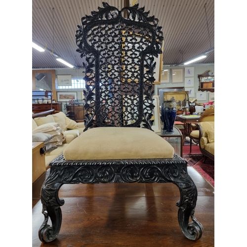 993 - A lovely 19th Century Padouk Hall Chair with a profusely carved outline and pierced panel back.
W 63... 