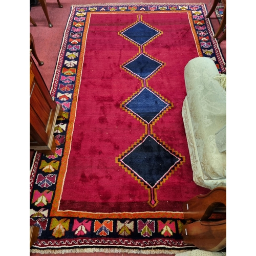 1009 - A thick pile hand woven Persian Gabby Carpet with an all over plain field and diamond medallion desi... 