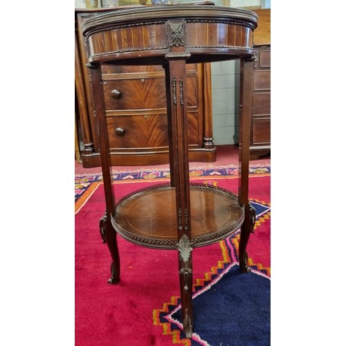 1010 - A 20th Century Walnut and veneered circular Side Table with  metal mounts and fluted supports.
H 73 ... 