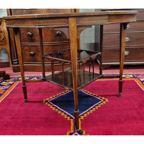 1022 - An Edwardian Rosewood and Veneered octagonal Centre Table with stretcher base and inlaid top.
H 71 x... 