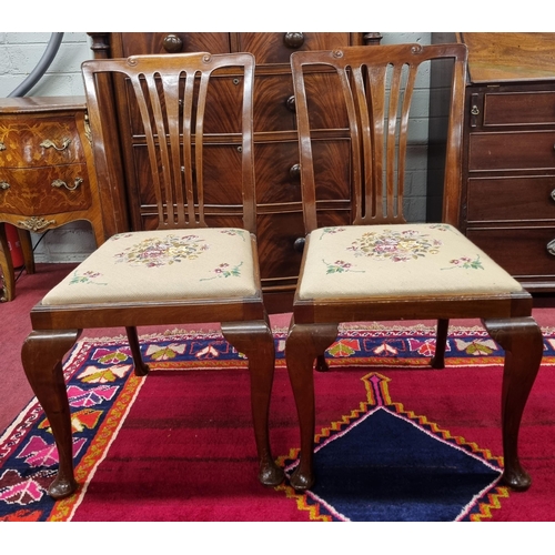 1051 - A good pair of 19th Century slat back Dining Chairs with cabriole supports and tapestry seats.
SH 44... 