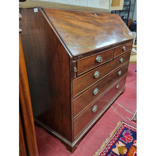 777 - A Fantastic Georgian Mahogany Bureau with original oval drop handles and fully fitted interior.
W 12... 