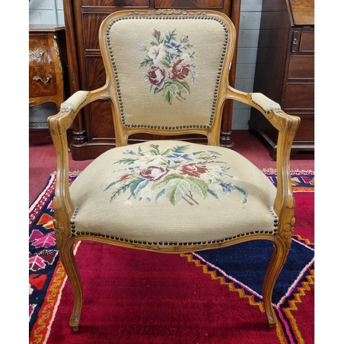 780 - A good Walnut showframe Armchair with tapestry upholstered seat and back. W 59 x SH 40 x BH 85 cm ap... 