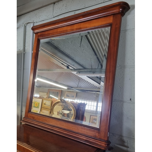 786 - A reproduction Mahogany Mirror with bevelled glass. 85 x 88 cm approx.