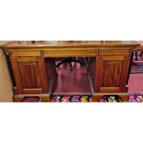 998 - A good reproduction Mahogany partners Desk with triple freeze drawer. W 150 x 74 x H 78 cm approx.