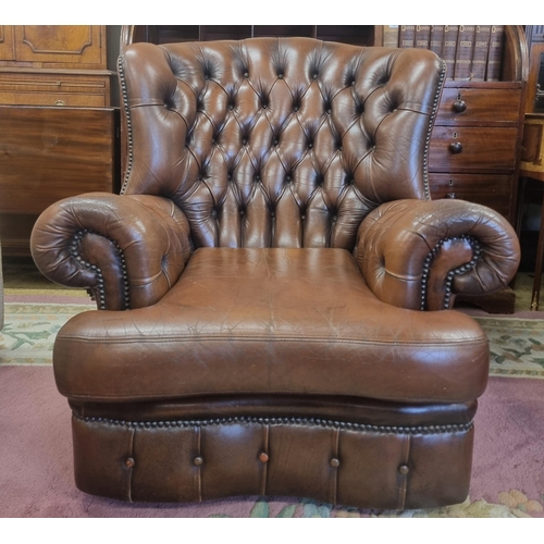 1032 - A good pair of leather effect deep buttoned wing back Armchairs. W 90 cm approx.