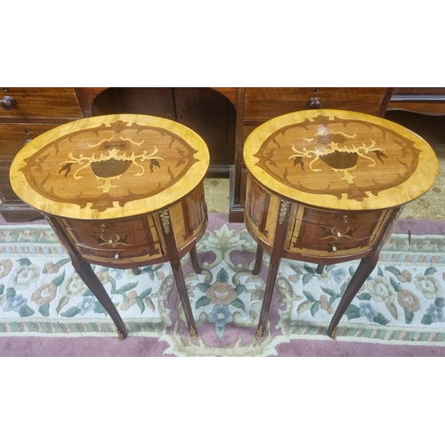 1033 - A good pair of Continental oval Side Tables with triple frieze drawer ormolu mounts and cabriole sup... 