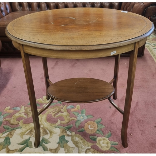 1039 - An Edwardian Mahogany and inlaid oval Centre Table with gallery base. 
H 72 x 75 x 55 cm approx.