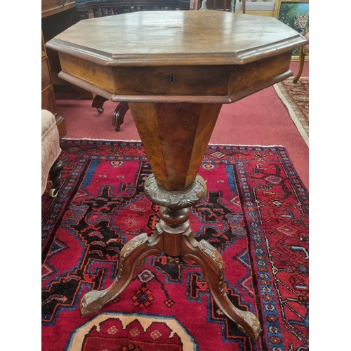 728 - A 19th Century Walnut work Table on a tripod base with fitted interior. W 45 x H 75 cm approx.