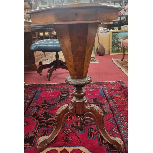 728 - A 19th Century Walnut work Table on a tripod base with fitted interior. W 45 x H 75 cm approx.