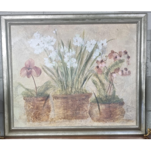 792 - A 20th Century Oil on Canvas still life of flowers in pots in a silvered frame. Indistinctly signed ... 