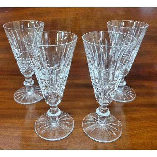 810 - A good quantity of Waterford Crystal to include a set of four champagne Flutes, a Salt and Pepper an... 