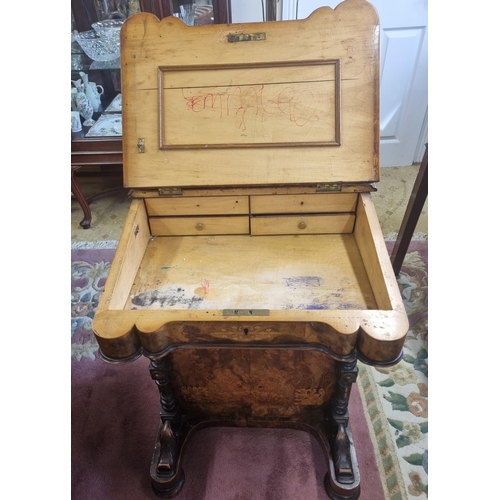 820 - A good 19th Century Walnut Davenport with graduated drawer side and turned front supports on bun fee... 