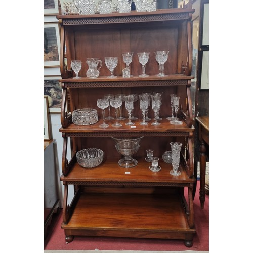 565 - A 20th Century Mahogany Waterfall Bookcase of large form with pierced outline sides. 90 x D 42 x H 1... 