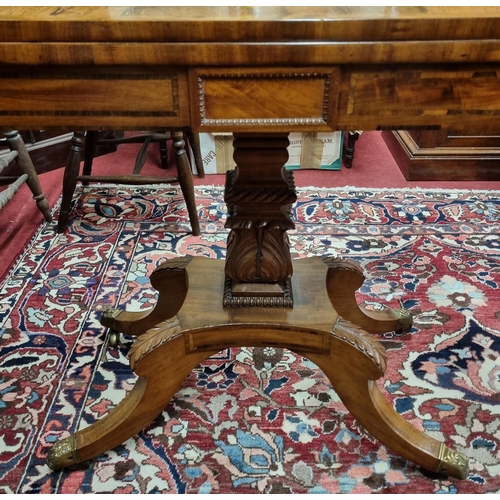 230 - A fantastic Regency Mahogany fold over Card Table on quatrefoil pedestal base and brass castors, rec... 