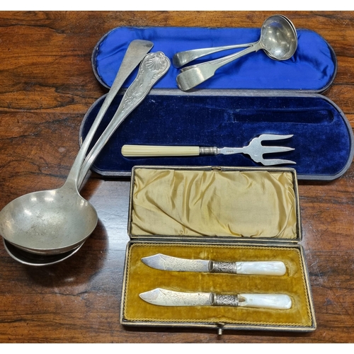 238 - A good quantity of cased Cutlery also to include two large soup Ladles and others.