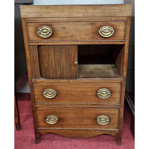 197 - A Regency Mahogany Gentleman's Valet with tambour door front and original oval ring handles.
54 x 45... 