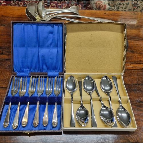 238 - A good quantity of cased Cutlery also to include two large soup Ladles and others.