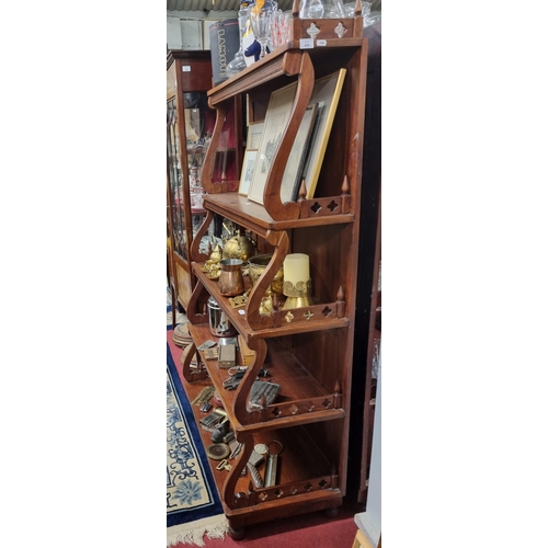 470 - A reproduction Mahogany Waterfall Bookcase of large size with pierced outline. W 90 x D 44 x H 165 c... 