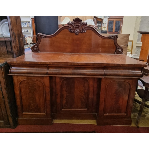 483 - A Victorian Mahogany Pedestal Sideboard with triple frieze drawer and carved gallery back.
 W 152 x ... 