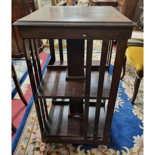 558 - An Edwardian Mahogany revolving Bookcase. 48 x 48 x H 91 cm approx.