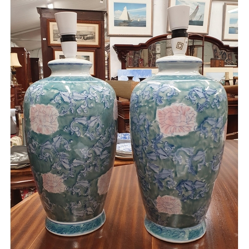 67A - A pair of green ground bulbous Oriental Table Lamps. H 45 cm approx.