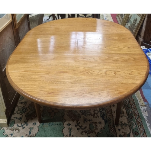 515 - A mid Century single leaf Dining Table possibly G Plan. Closed circular diameter 122 cm, Extended L ... 