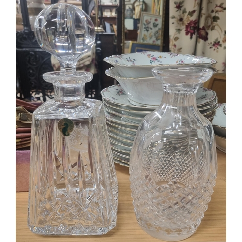 701 - Two Waterford Crystal Decanters, one missing stopper.