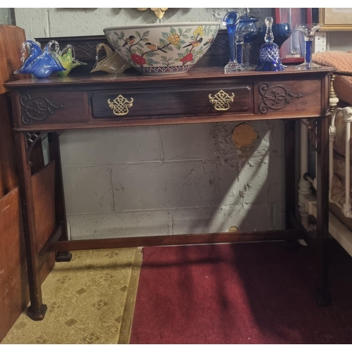 841 - An early 20th Century Mahogany Side Table with gallery back and single frieze drawer on canted corne... 