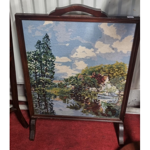 942 - A Georgian Mahogany Corner Washstand along with an urn stand and a fire screen.