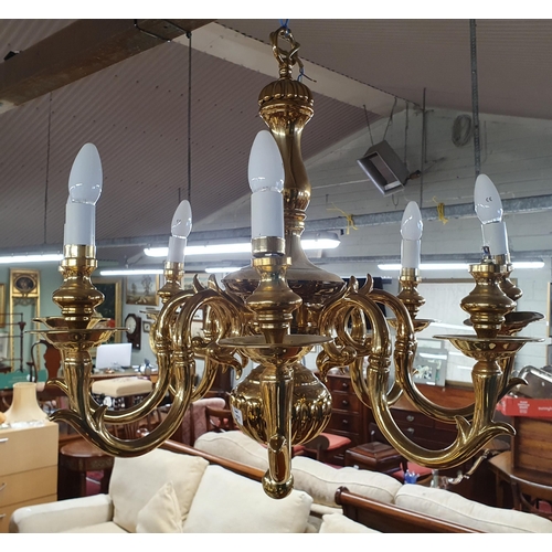 1071 - A really good heavy Brass eight branch Chandelier with ribbed and bulbous outline. L 66 x D 70 cm ap... 