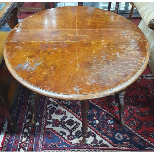 1101 - A 19th Century Walnut Sutherland Table. The top in need of some restoration.
H 64 x W 86 x D 75 cm a... 