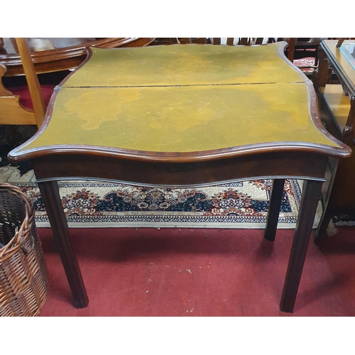 1106 - Of Superb quality. An early Georgian Mahogany serpentine fronted foldover Card Table on square flute... 