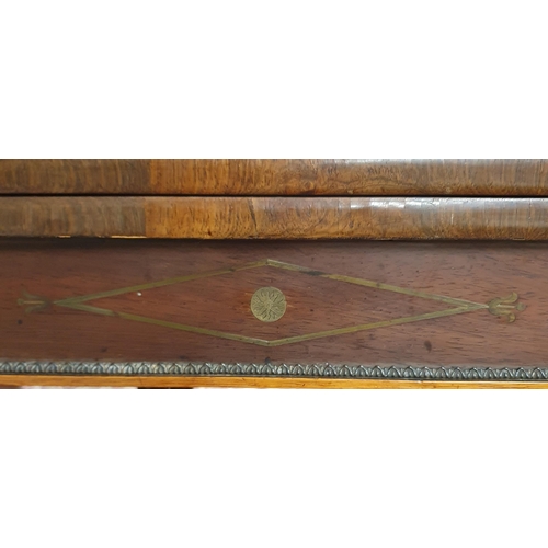 1118 - A fantastic early Regency Rosewood and brass inlaid fold over Card Table on turned reeded supports a... 