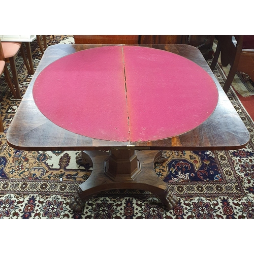 1121 - A Fantastic early 19th Century Irish Rosewood fold over card Table on octagonal support and tripod b... 