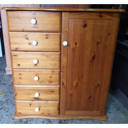 1307 - A Pine storage cupboard .
H 105 x W 95 x D 57 cm approx.