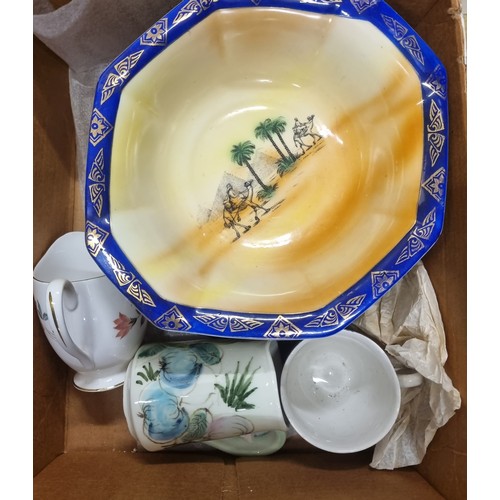 549 - A good quantity of Wedgewood and other Dinner Wares.(on the table and in crates)