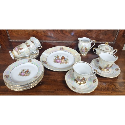 910A - An Italian Part Coffee set along with a Polish part Tea Set.