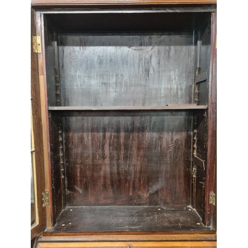 905 - An Edwardian Mahogany and Inlaid Bureau Bookcase with urn inlaid flap. (possibly marriage).
W 79 x H... 