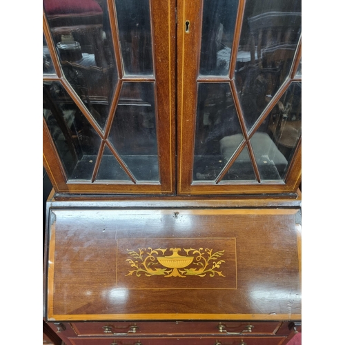 905 - An Edwardian Mahogany and Inlaid Bureau Bookcase with urn inlaid flap. (possibly marriage).
W 79 x H... 