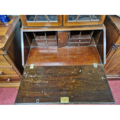 905 - An Edwardian Mahogany and Inlaid Bureau Bookcase with urn inlaid flap. (possibly marriage).
W 79 x H... 